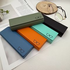卸売りの手作りのメガネの箱の純色のシンプルな近視鏡のサングラスの収納の箱の携帯のサングラスの箱はLOGOを印刷することができます。