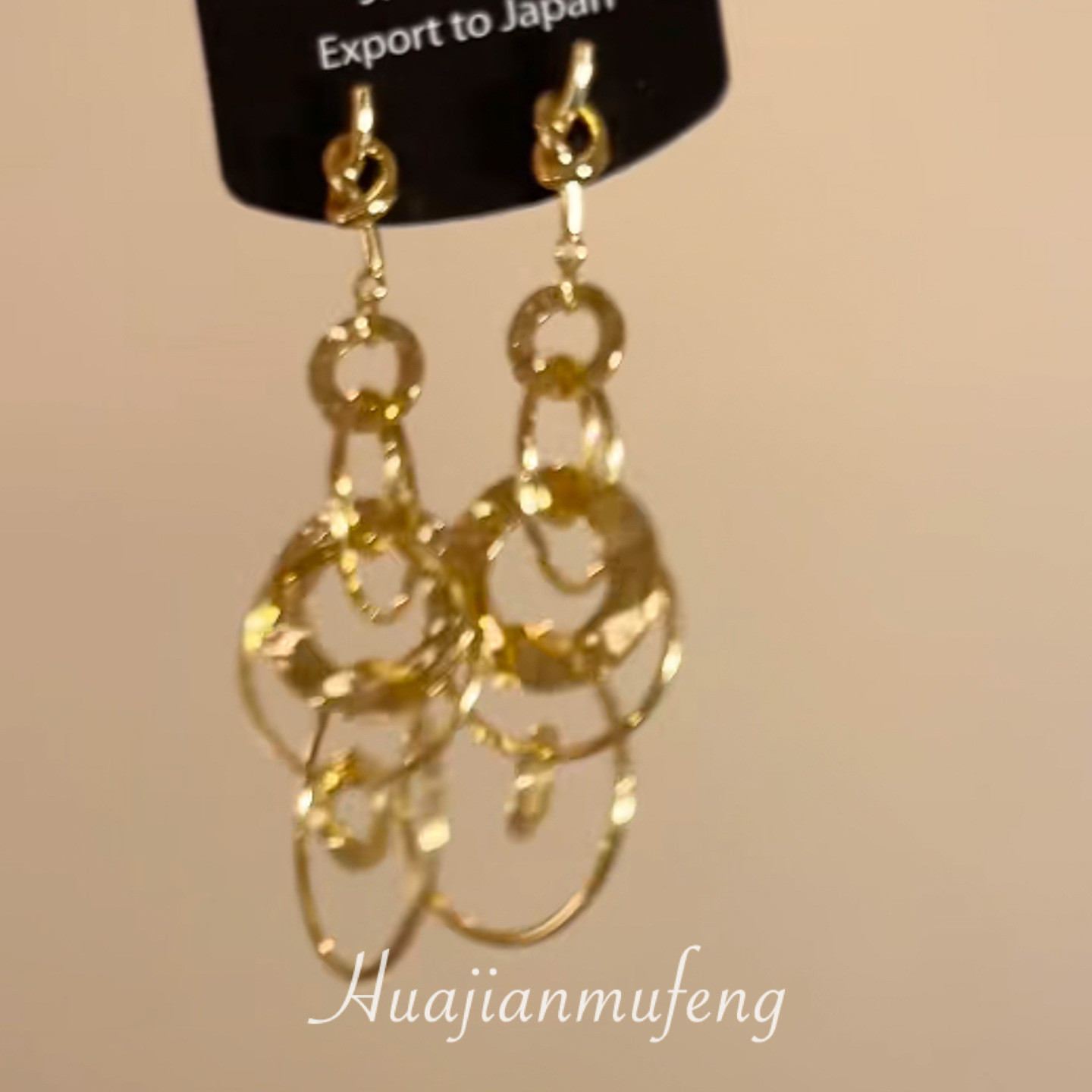 Golden geometric ear clips