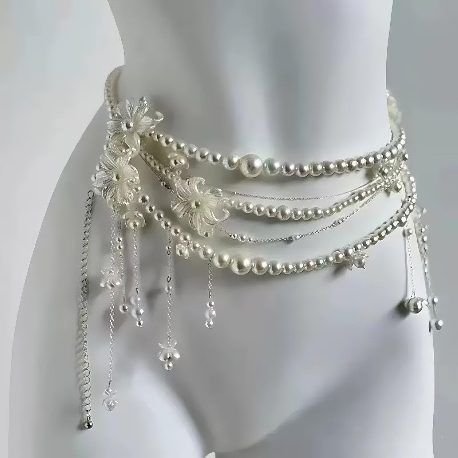 Luz lujosa y sexy flor perla cintura multicapa cadena de moda alta personalidad nicho temperamento combinado cintura mujer