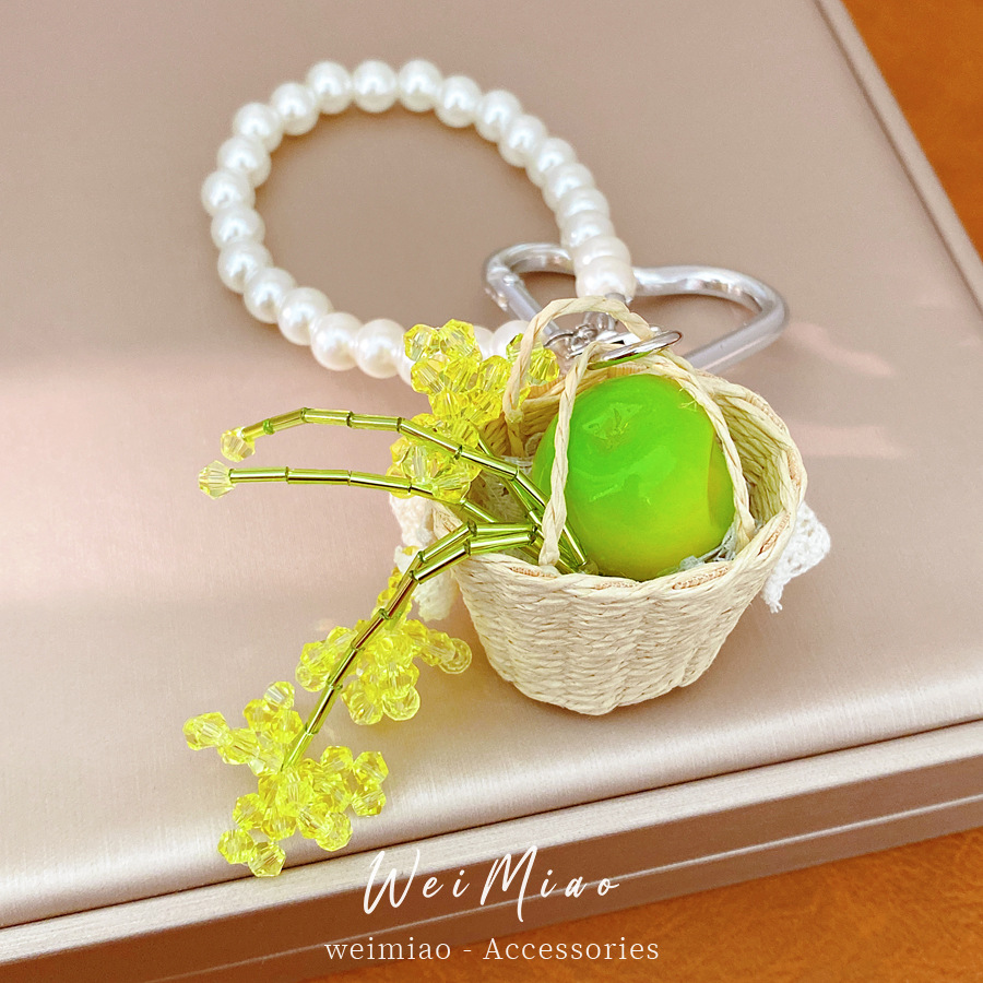Perlas cuentas de vidrio manzana encaje trenzado canasta colgante simple moda colgante de llaver