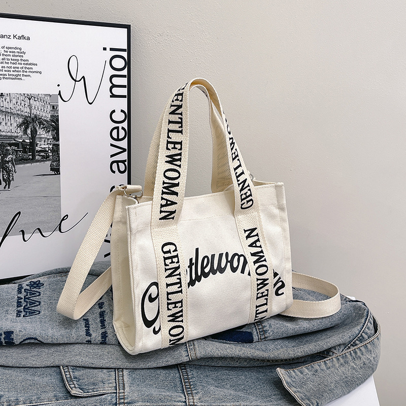 GentleWoman hombro letras bolso de lona portátil 2025 nuevo tailandés nicho transfronterizo bolso de hombro