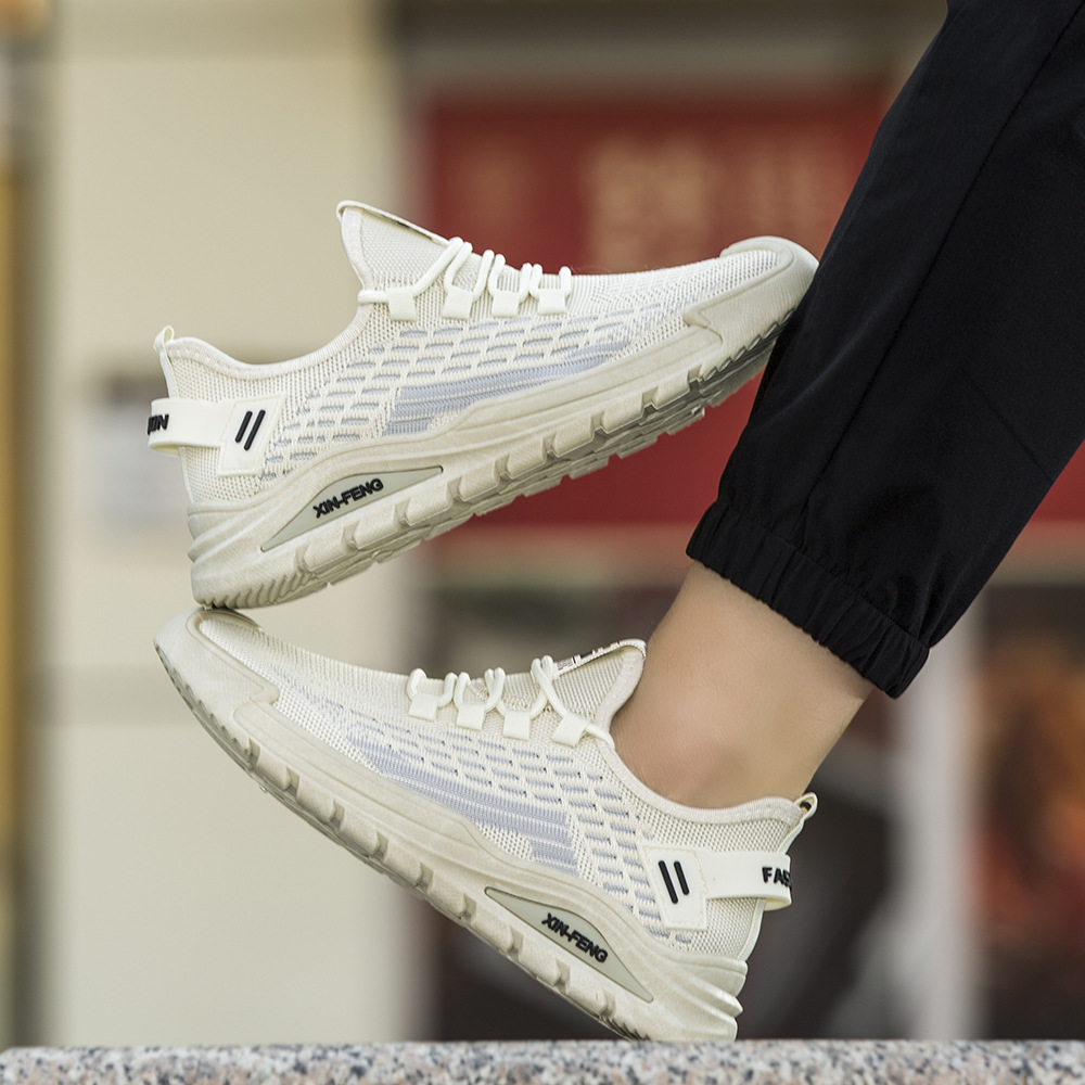 Zapatos de malla para hombre otoño nuevo estilo de moda zapatos casuales zapatos casuales al aire libre para jóvenes zapatos deportivos tejidos voladores al por mayor