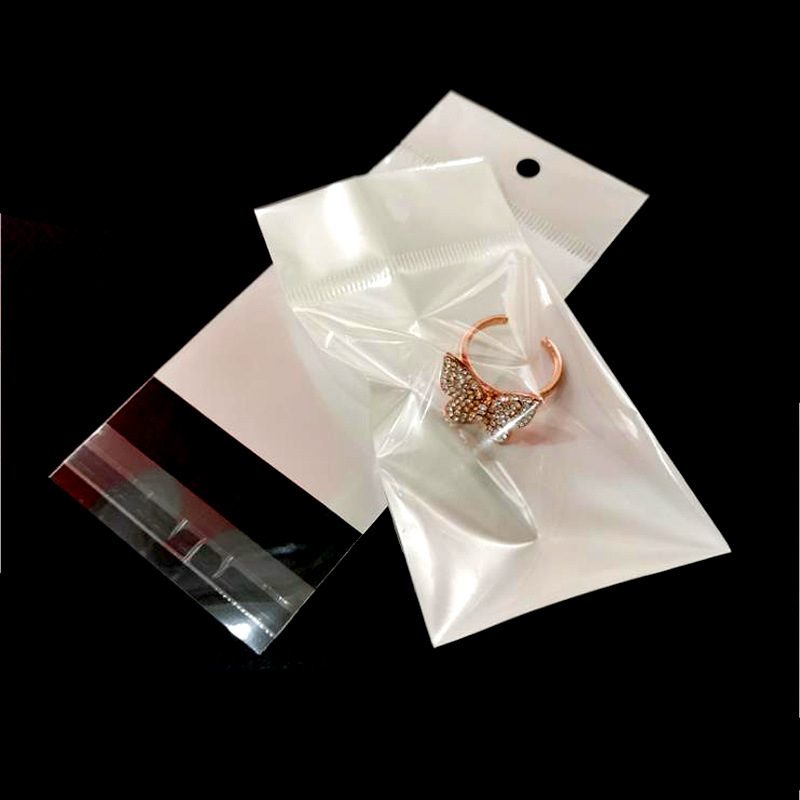 饰品塑料包装袋阴阳白色珠光卡头密封袋opp自粘自封口袋现货批发