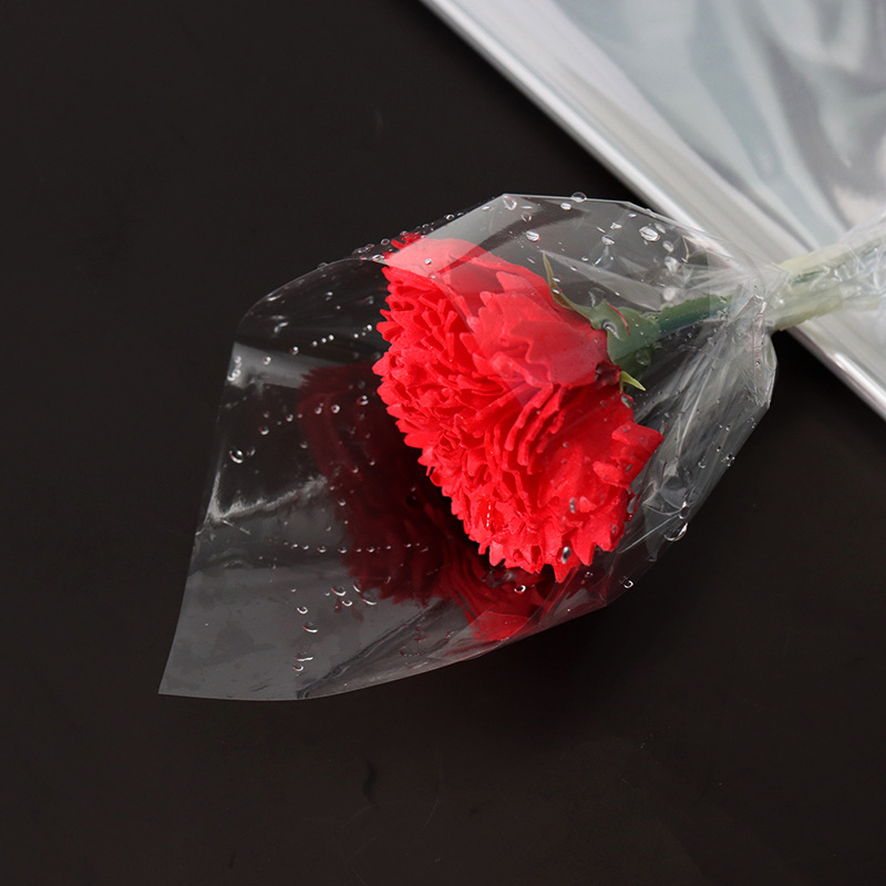 Papel de embalaje de flores al por mayor de la fábrica de papel de embalaje floral bouquet base de la tienda de flores papel impermeable totalmente transparente celofán