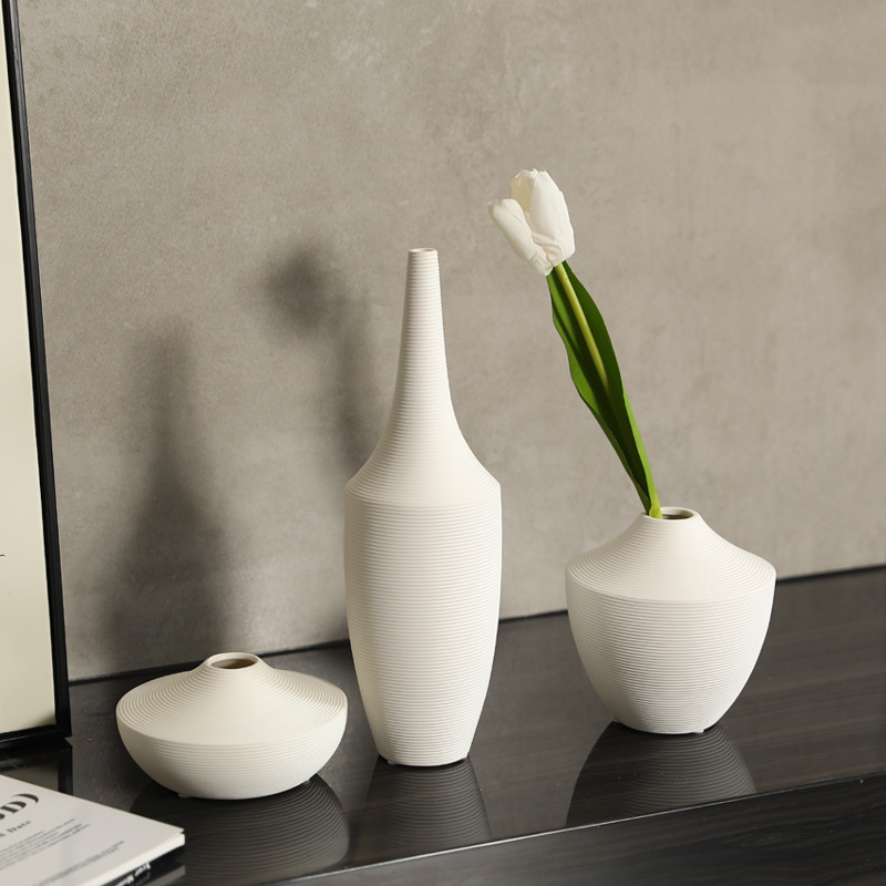 Jarrón de cerámica Wabi-Jifeng simple Decoración del hogar Arreglo floral seco Sala de estar Decoración de estudio Flor pequeña de boca estrecha al por mayor