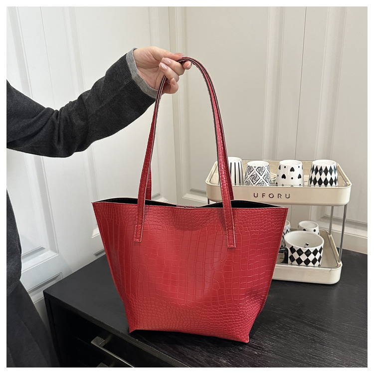 Borsa a secchiello donna con motivo coccodrillo borsa spalla_voghion.com