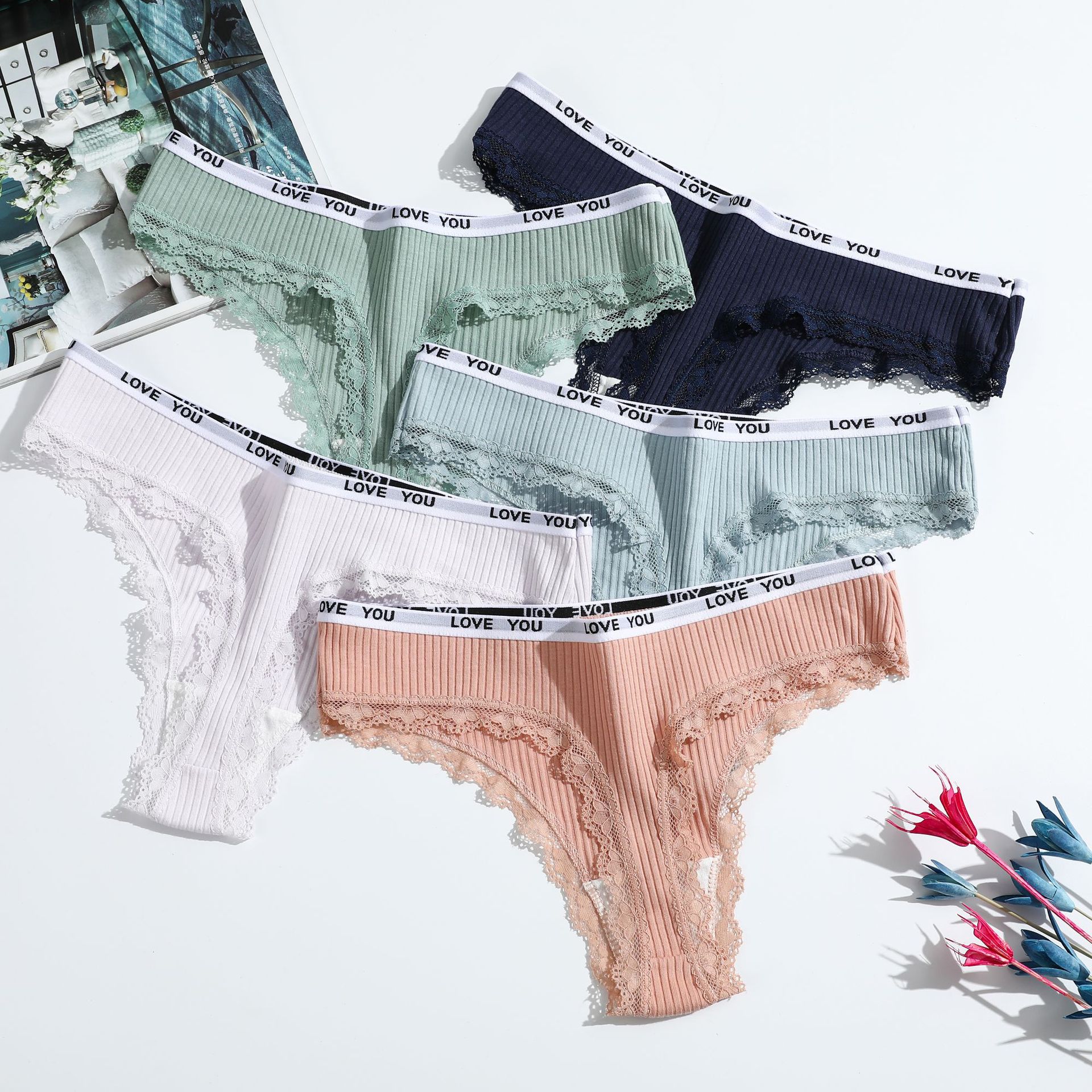 Nueva Tanga de algodón de las mujeres de cintura baja ropa interior de las muchachas de encaje europeo y americano de las mujeres pantalones de cadena de la fábrica al por mayor