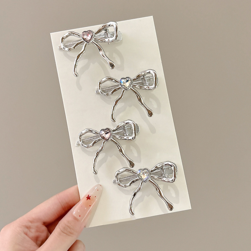 Arco de diamante de alta sensación de amor clips para el cabello dulce cool girl plateado clip de boca de pato lateral clip de cabello frisa clips adornamiento para el cabello