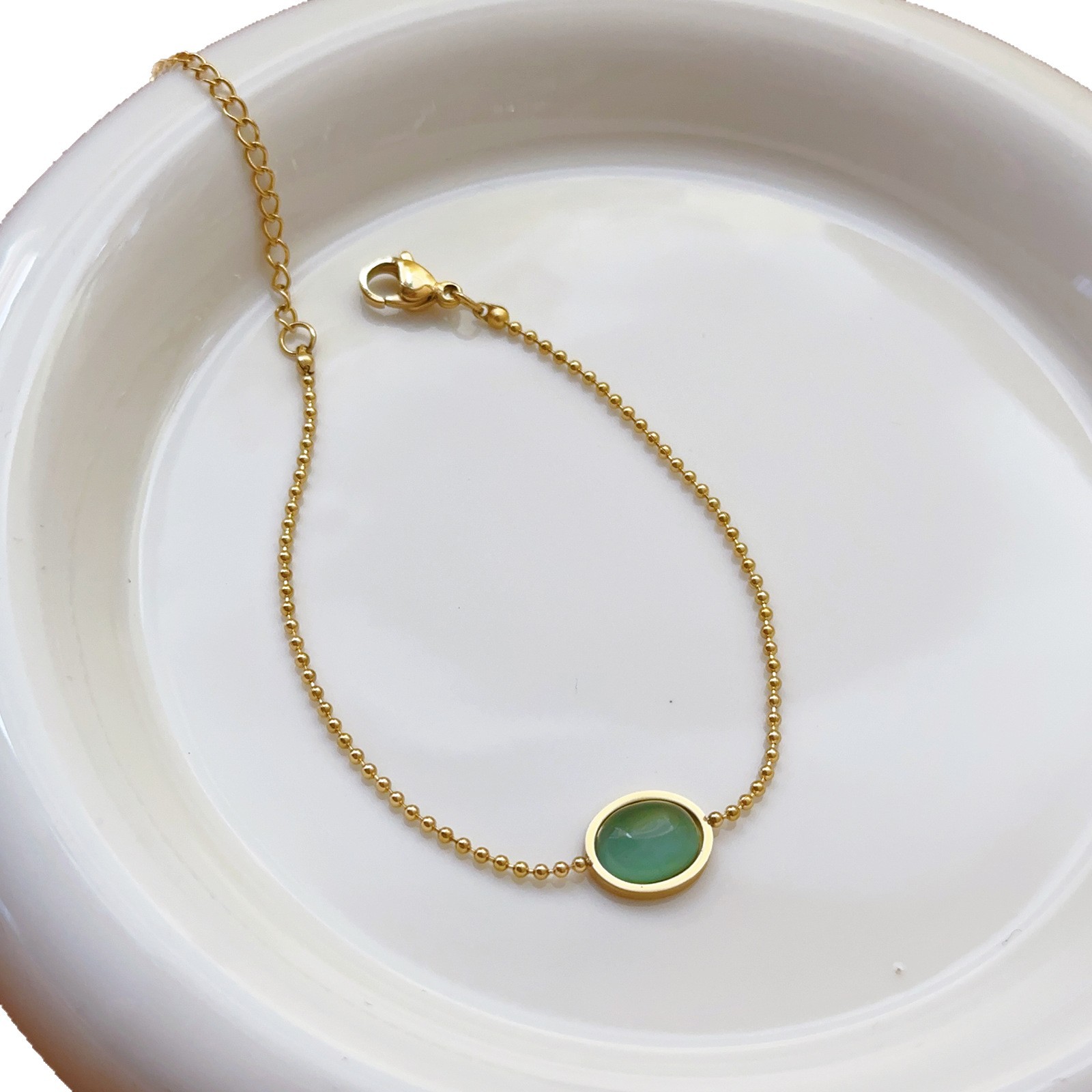 Nueva pulsera de acero de titanio simple sin decoloración, niña, sentido de alta gama, gota de agua, moda de verano, corazón de amor de lujo ligero, tobillera, todo fósforo