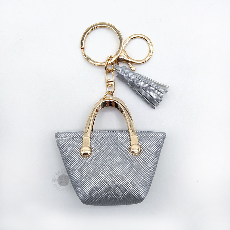 Llavero para mujer, bolso, colgante, joyería, mini monedero de almacenamiento de cuero lindo europeo y americano