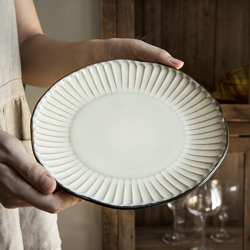 Retro irregular plato plano hermoso plato de carne en relieve plato de cerámica doméstica exportación transfronteriza