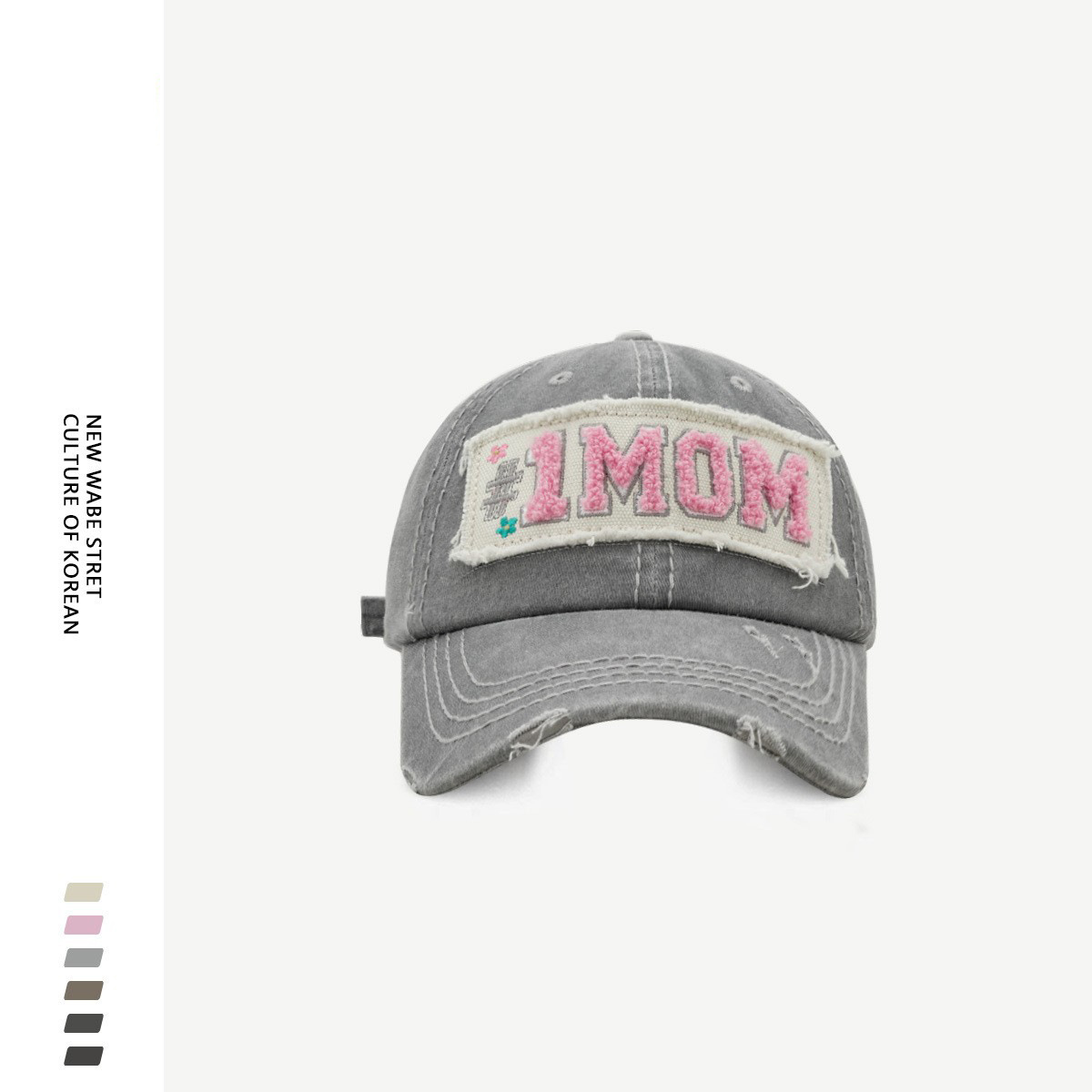 Toalla de diseño original carta bordada etiqueta de tela gorra de béisbol hombres y mujeres Otoño e Invierno estilo coreano moda de la calle rasgado gorra de pico