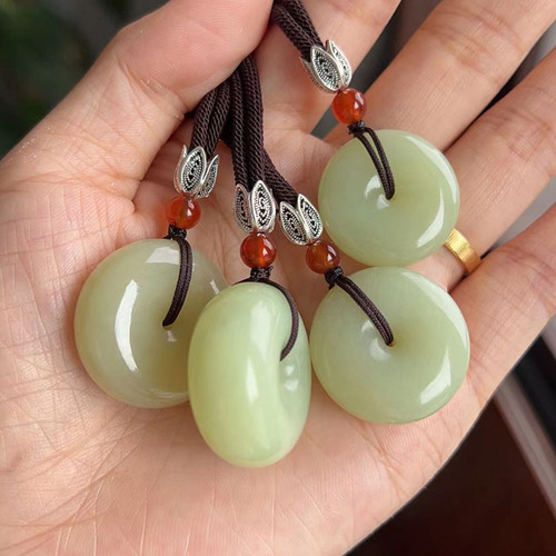 Natural jade peace buckle Hetian jade button pendant Xiuyan tremolite yellow and white old jade peace buckle pendant wholesale