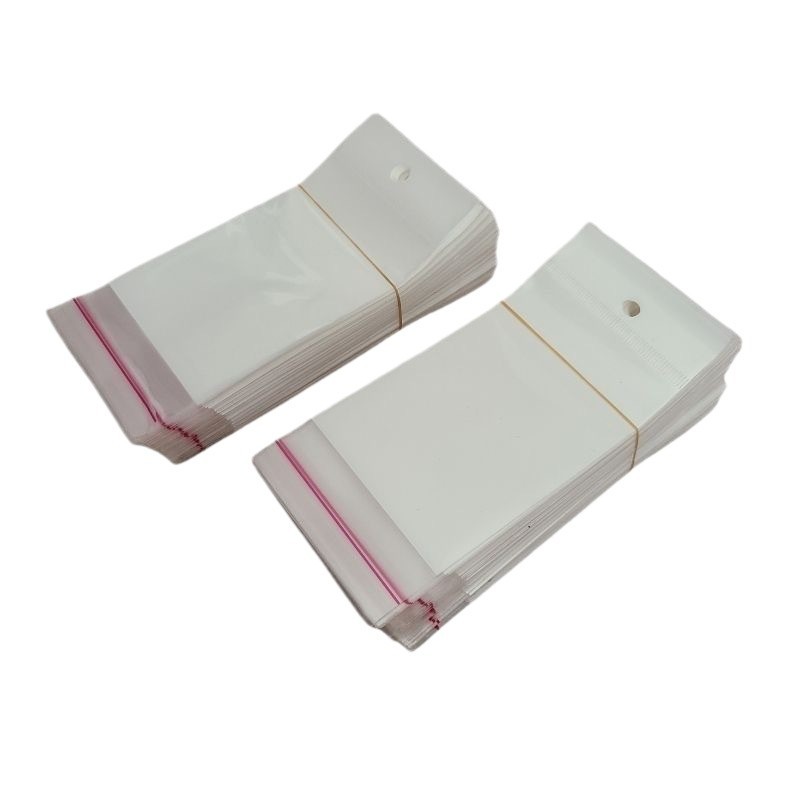 OPP transparente plástico auto-adhesivo bolsa colgante agujero desgaste uñas joyería bolsa clip largo avión bolsa de embalaje al por mayor