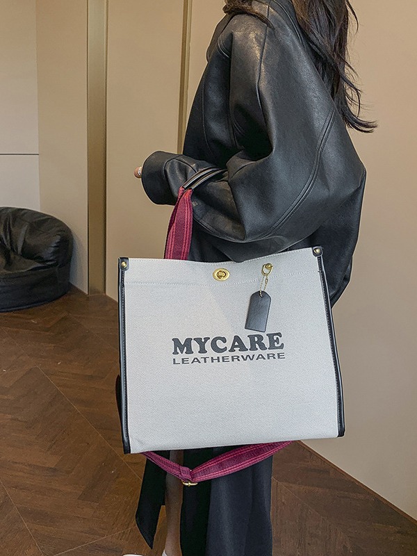 Gran capacidad de viaje al trabajo bolso de mano para mujeres 2024 nuevo lino retro color contraste mochila de hombro