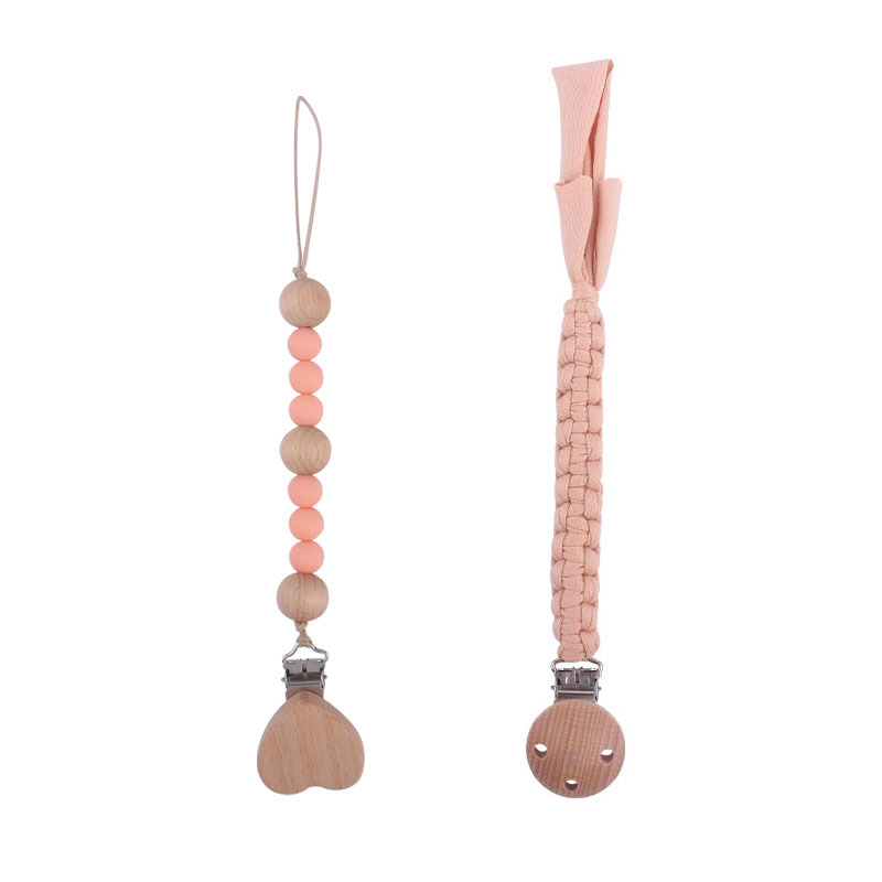 Nuevos suministros para bebés Beech Love Clip calmante bebé tela de algodón anti-gota Cadena de silicona perlas pezón cadena traje