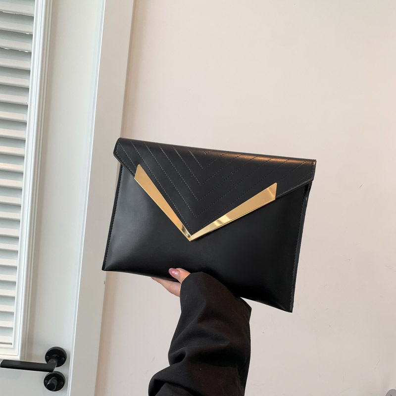 2023 otoño e invierno nuevo bolso de noche de embrague de estilo coreano para mujeres Bolsa pequeña elegante de color puro de moda de este año para mujeres