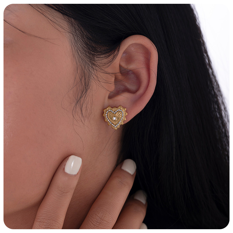 Taina europa 18k oro verdadero electro galvanizado de acero de moda viento de viaje irradiando luz amor aretes de acero inoxidable al por mayor