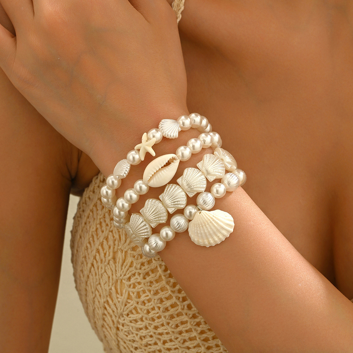 Bracciale elegante da donna con perle e conchiglie naturali_voghion.com