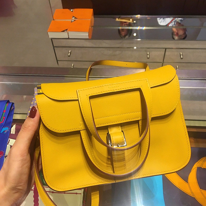 Venta directa de la fábrica 2024 nuevo maletín de cuero de vaca con patrón de litchi en la primera capa de primavera y verano, bolso de mujer con cuero de vaca en un hombro