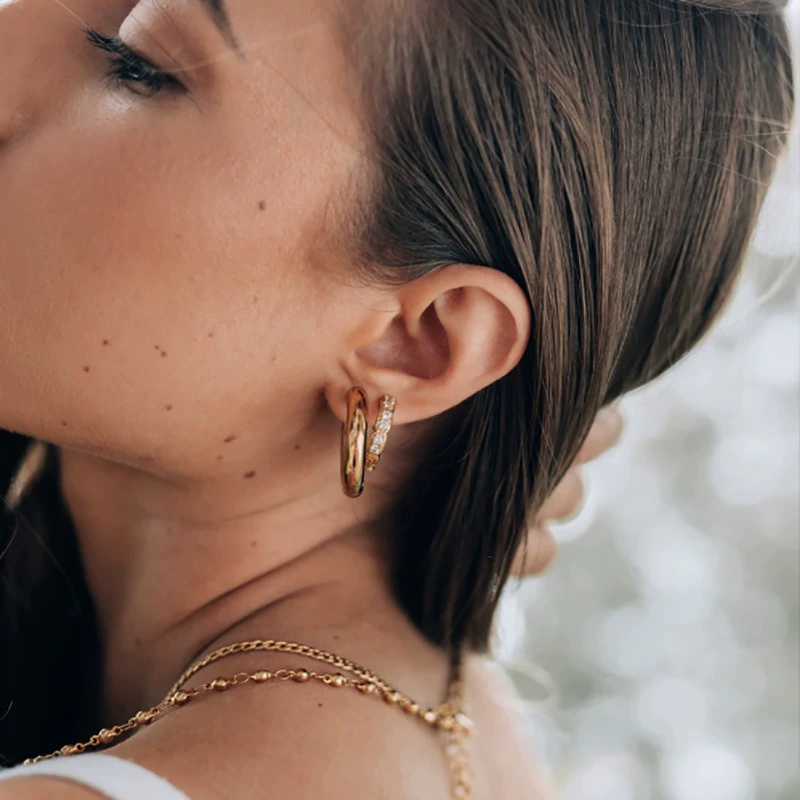 Brand earrings stainless steel, European style, 750 sample gold, gold and silver