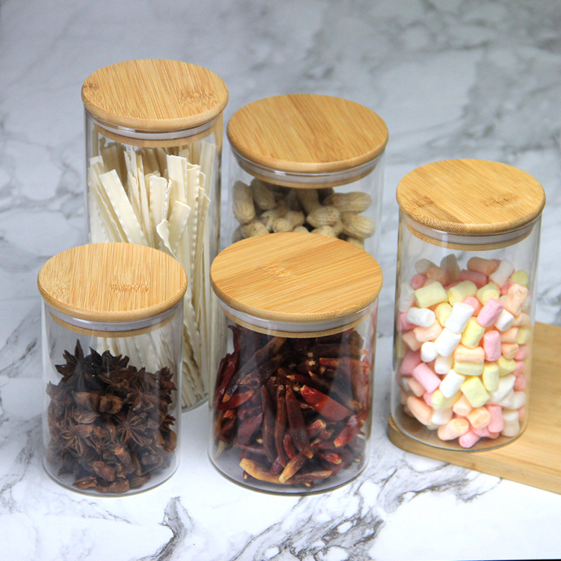 Fábrica al por mayor Li Gan Tanque de almacenamiento de vidrio Tanque sellado Granos diversos Caramelo Tarro de té Tarro de tapa de bambú Botella de almacenamiento de cocina