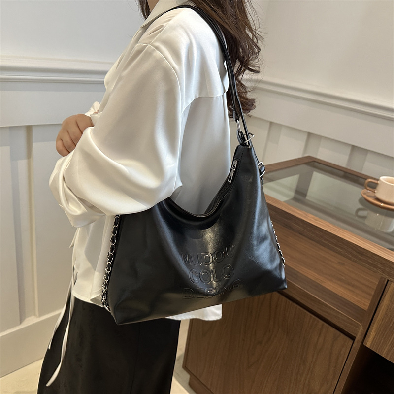 Casual bolsa de plata de gran capacidad para mujeres 2024 nuevo paquete de hombro universal mochila de hombro bolsas de cubo de viaje