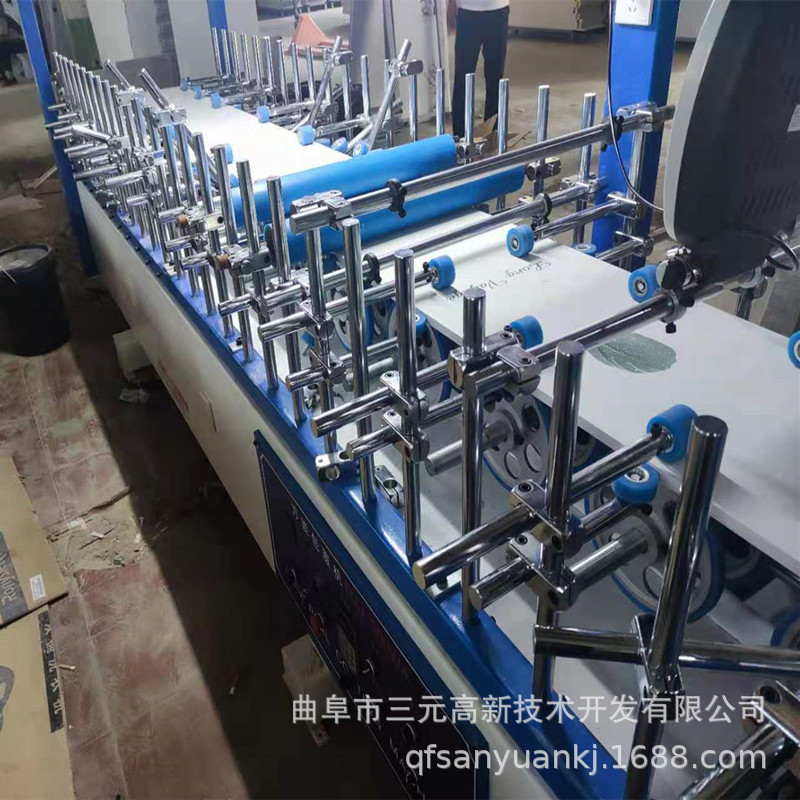 600宽集成墙板包覆机  凹凸异型板材pvc自动包覆机 三元厂家直供