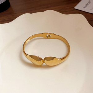 Pulsera abierta con cara de gota de agua de acero inoxidable 40