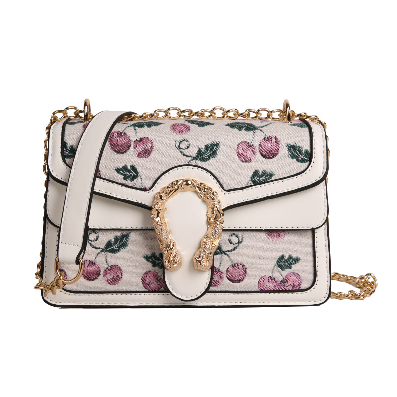 Hong Kong estilo retro Baco 2025 verano nuevo bolso de cadena moda cereza bolso de hombro color de contraste bolso de mensajero para mujer