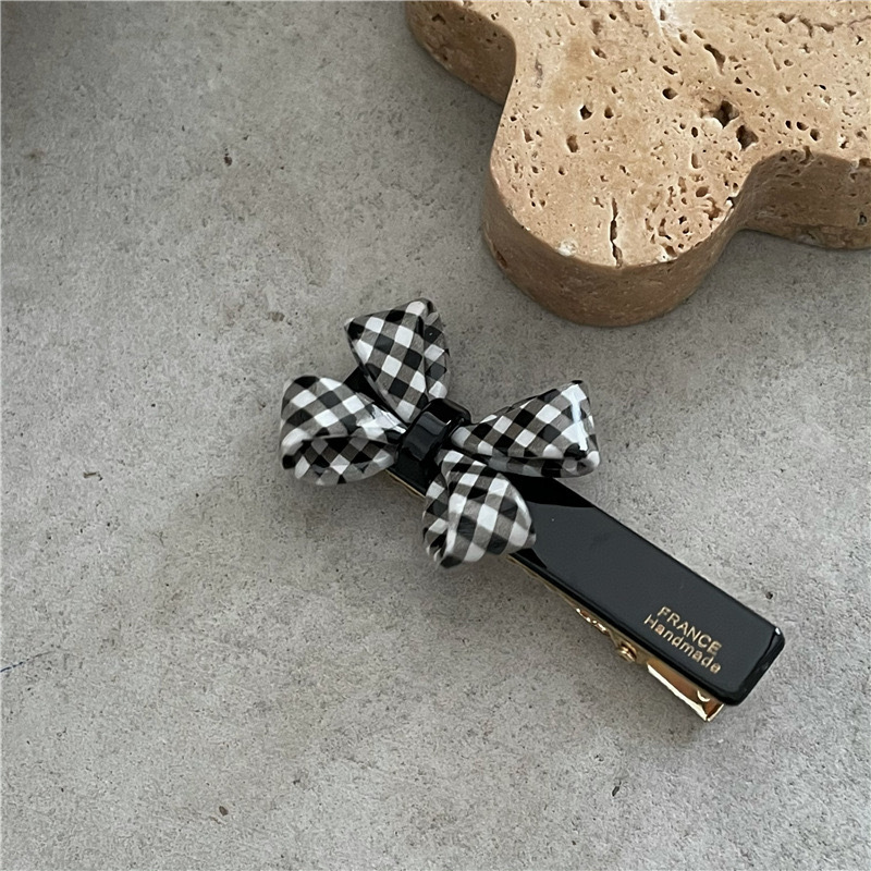 Sweet Bow Knot Arylic Hair Clip display picture 6
