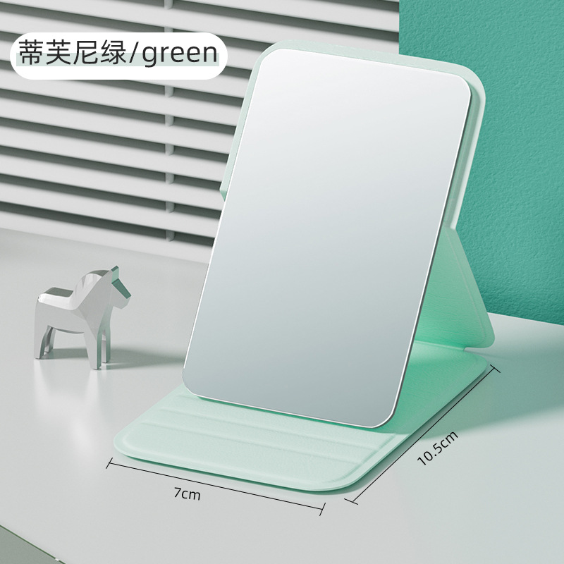 Espejo pequeño de escritorio de alto valor facial espejo de maquillaje plegable portátil dormitorio de estudiantes pequeño espejo cuadrado espejo doméstico unisex