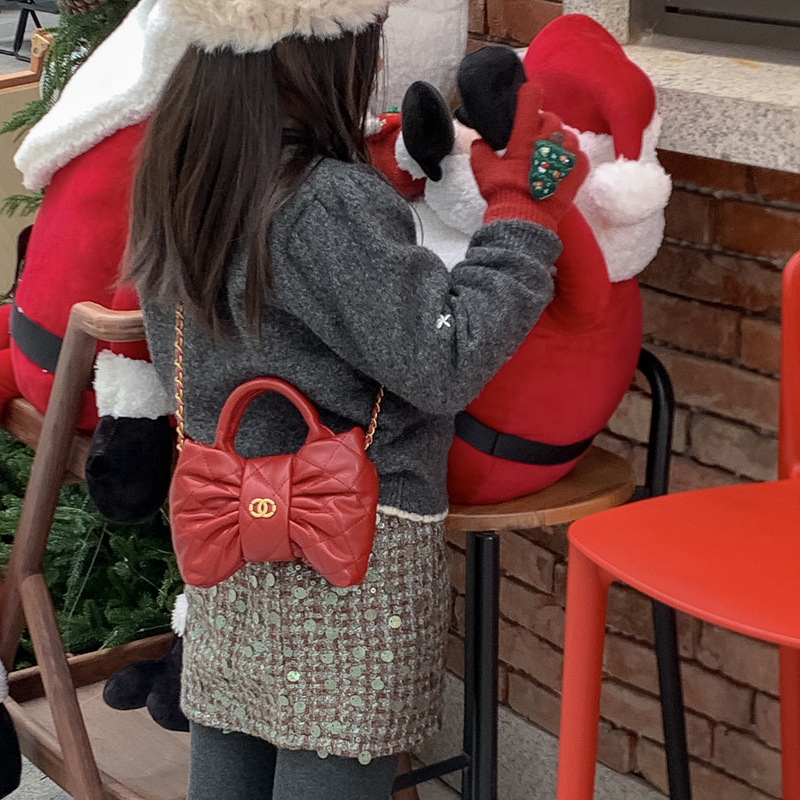 Bolsa de mano de chicas arco dulce cadena de diamante pliegue bolso de hombro 2026 nuevo bolso infantil transfronterizo