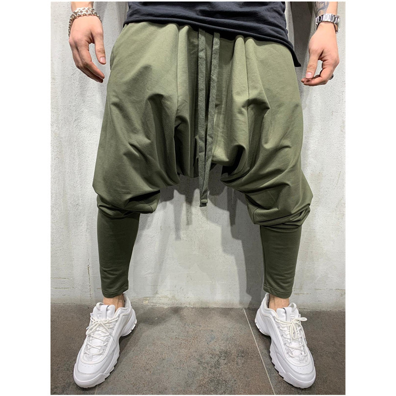 2022 de los nuevos hombres hip hop moda Pantalones europeos y americanos flojos color sólido flacos calle deportes casual harem
