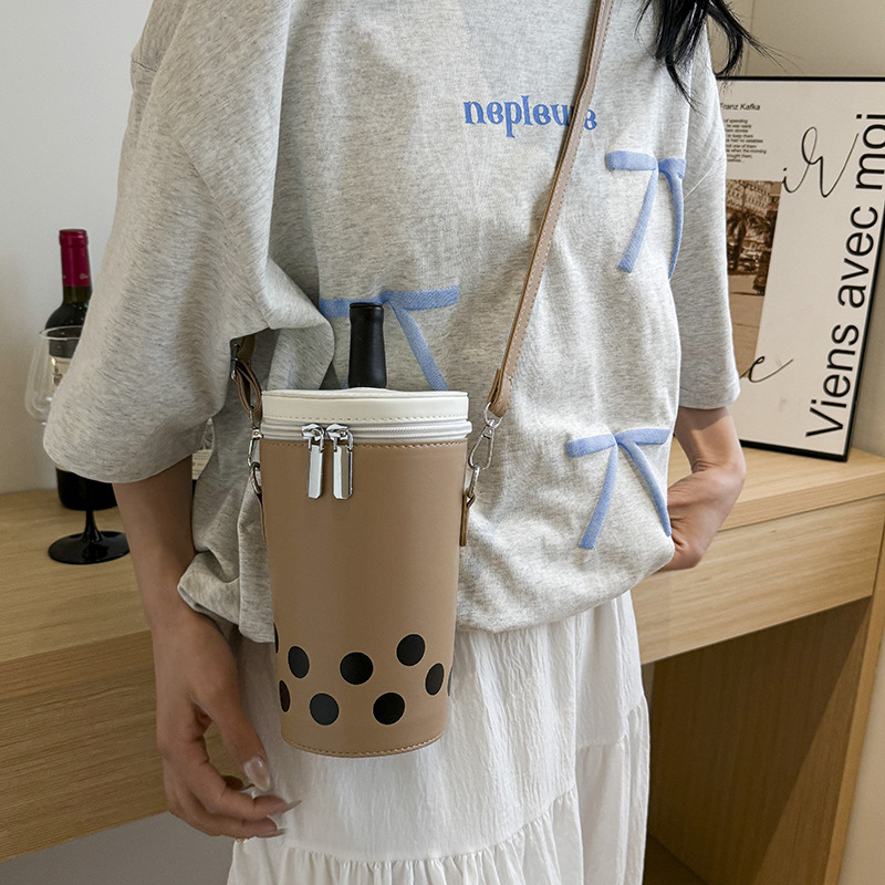 Piima-teekruusi isikupärastatud naiste ühe õlaga õlakott, trendikas uus 2024. aasta plahvatusohtlik Korea magevee ämbrikott_voghion.com