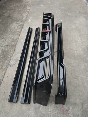 with front lip, side skirts, Big Surrounded - four-piece-set-with-painted-finish