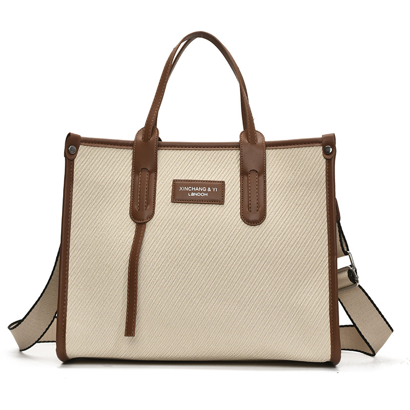 Bolso de gran capacidad para mujer 2025 verano nuevo estilo moda contraste color costura mensajero bolso simple de viaje