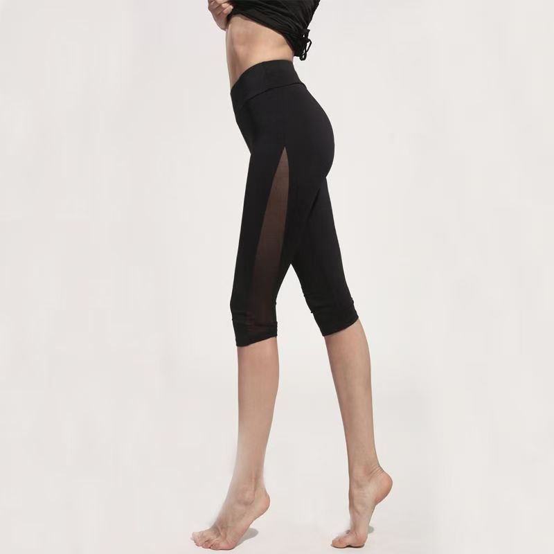 Primavera y verano yoga siete pantalones de malla de mujer empalmado hueco cintura alta pantalones deportivos para correr pantalones de ejercicio pantalones de bicicleta