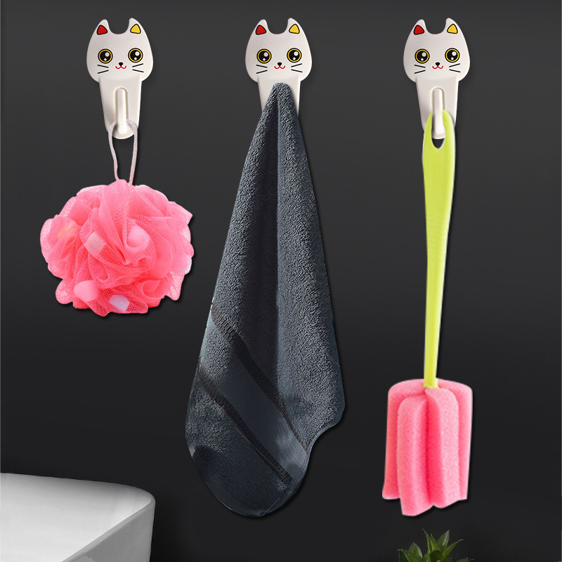 Gancho pegajoso de dibujos animados sin perforar cocina doméstica gancho sin costuras lindo ventosa ropa gancho pequeño gancho pegajoso detrás de la pared de la puerta