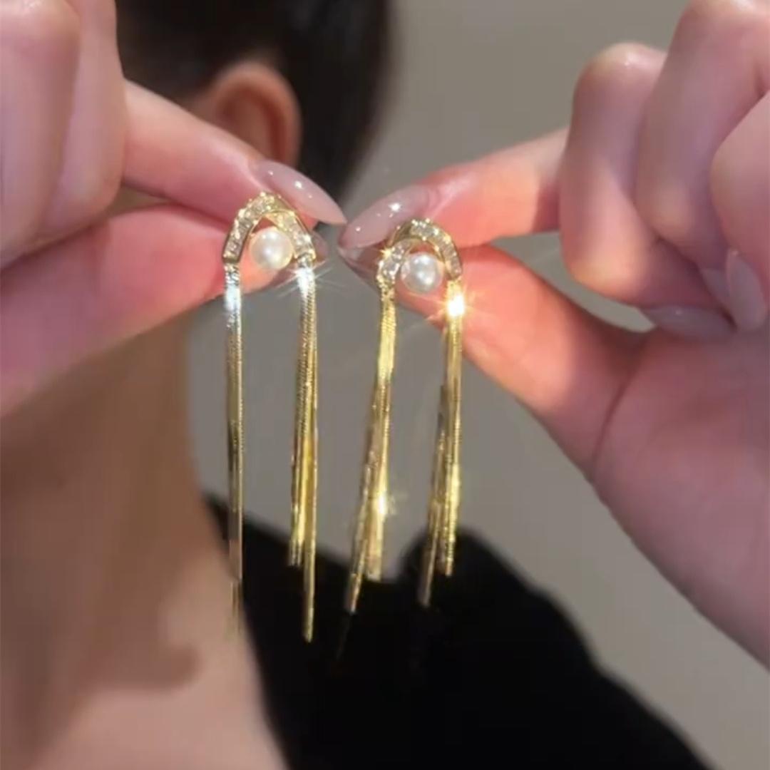 Long golden fashionable elegant design hypoallergenic earrings with…