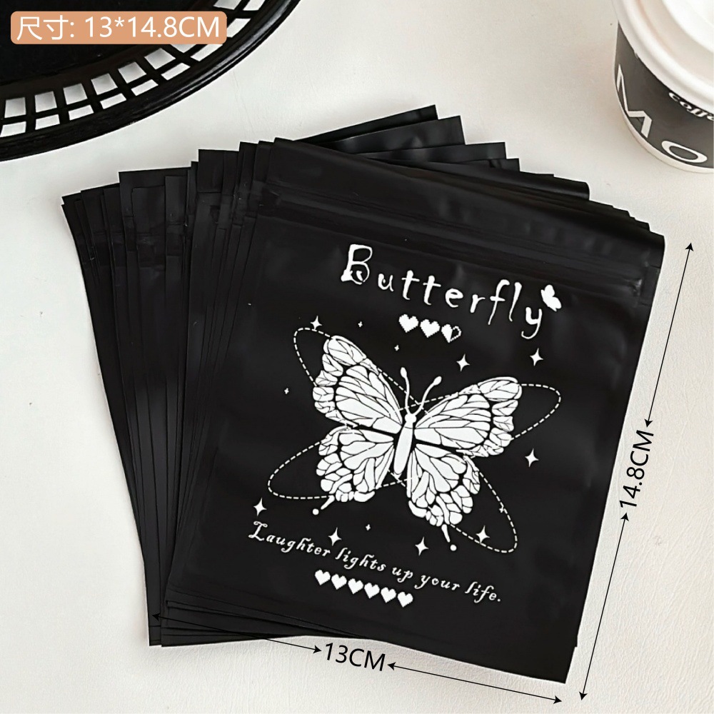 Bolsa de alto valor negro y blanco mariposa auto-sellada, pequeña bolsa de regalo, bolsa de embalaje de regalo, bolsa de sellado de viento, pequeña bolsa ciega