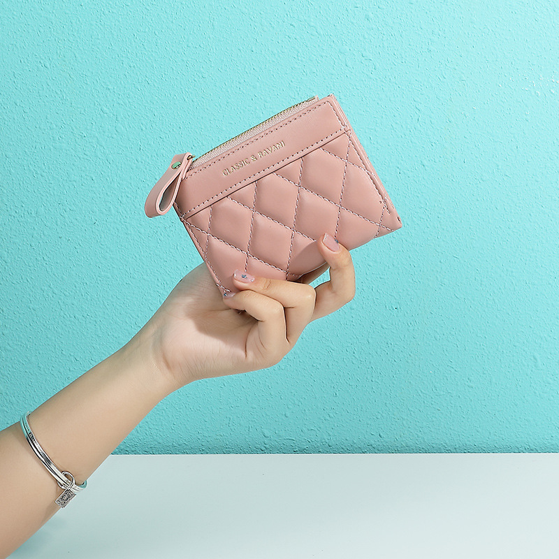 2025 primavera nueva Europa y los Estados Unidos nueva billetera en mujeres corta cremallera de diamante bordado moda alta 20% de descuento