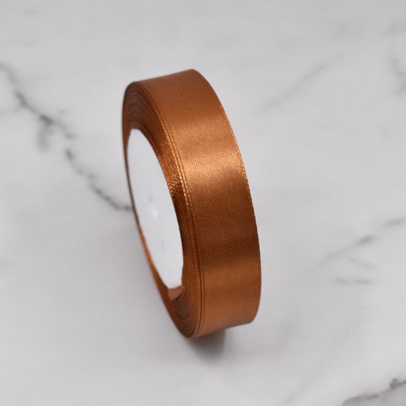 1159 # marrón dorado * ancho 2.5-2.6cm largo 22.8 m/rollo