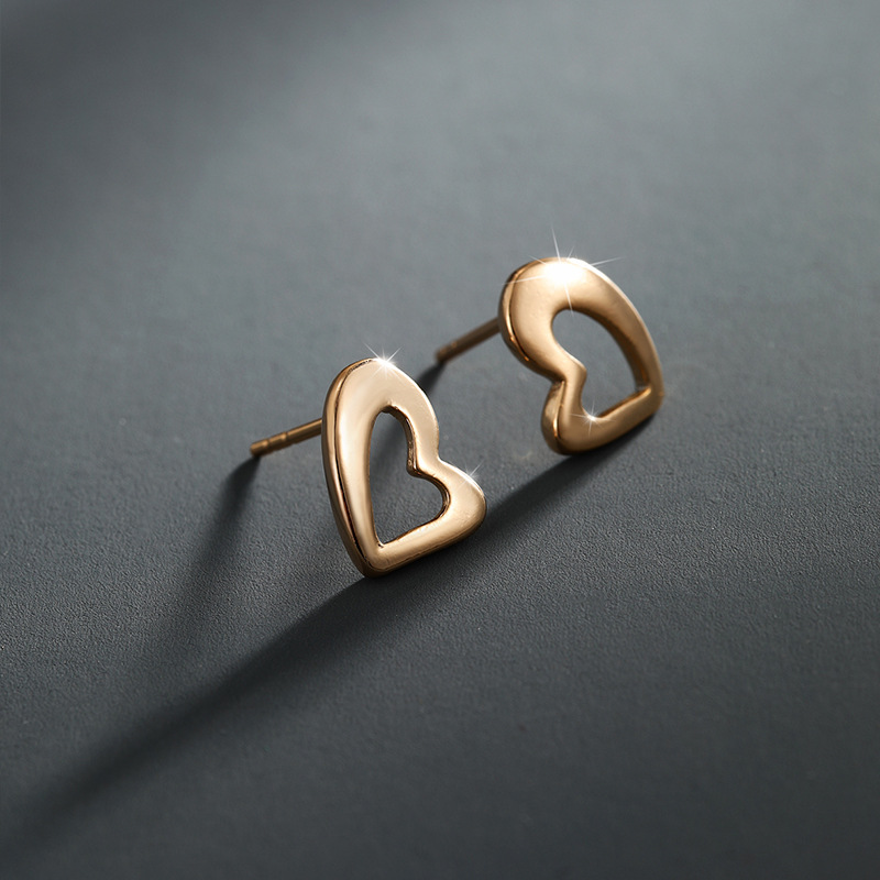 Xupeando joyería de oro pendientes de alto grado temperamento pendientes encantadores nichos femeninos diseño melocotón corazón pendientes joyería de moda