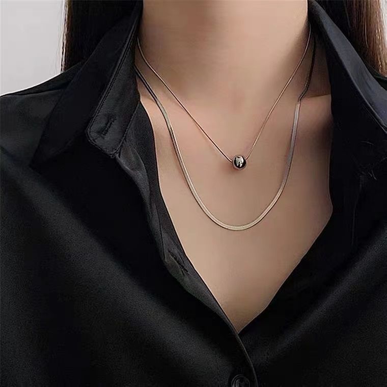 A niche temperament necklace for women with collarbone titanium steel chains, double-layer round bead necklaces, a light_voghion.com