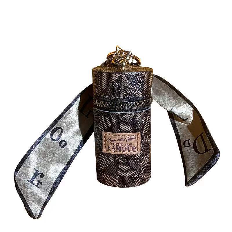 2025 nuevo estilo europeo y americano presbiterio mini bolso pequeño monedero colgante para niñas bolso para auriculares sobre rojo llavero de coche