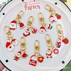 クリスマスの鍵はかわいい漫画のクリスマスツリーの老人の鈴の雪の花のペンダントの金属のペンダントの小さい贈り物欧米
