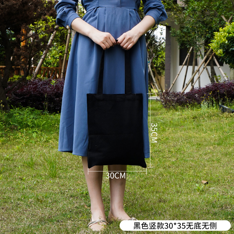 Bolsa de lona pequeña negra simple de las mujeres en stock bolsa de lona portátil en blanco Fábrica crossbody estudiante publicidad artística de un solo hombro