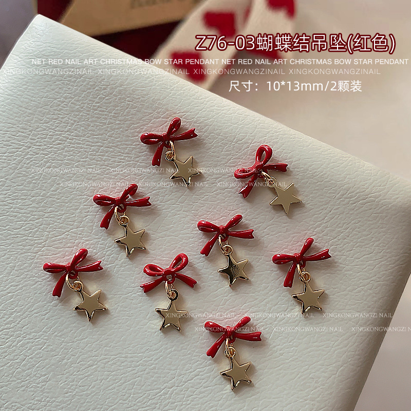 Navidad arco joyas de manicura otoño y invierno nuevo tipo de alta protección de color pentagonal aleación colgante tridimensional accesorios de uñas