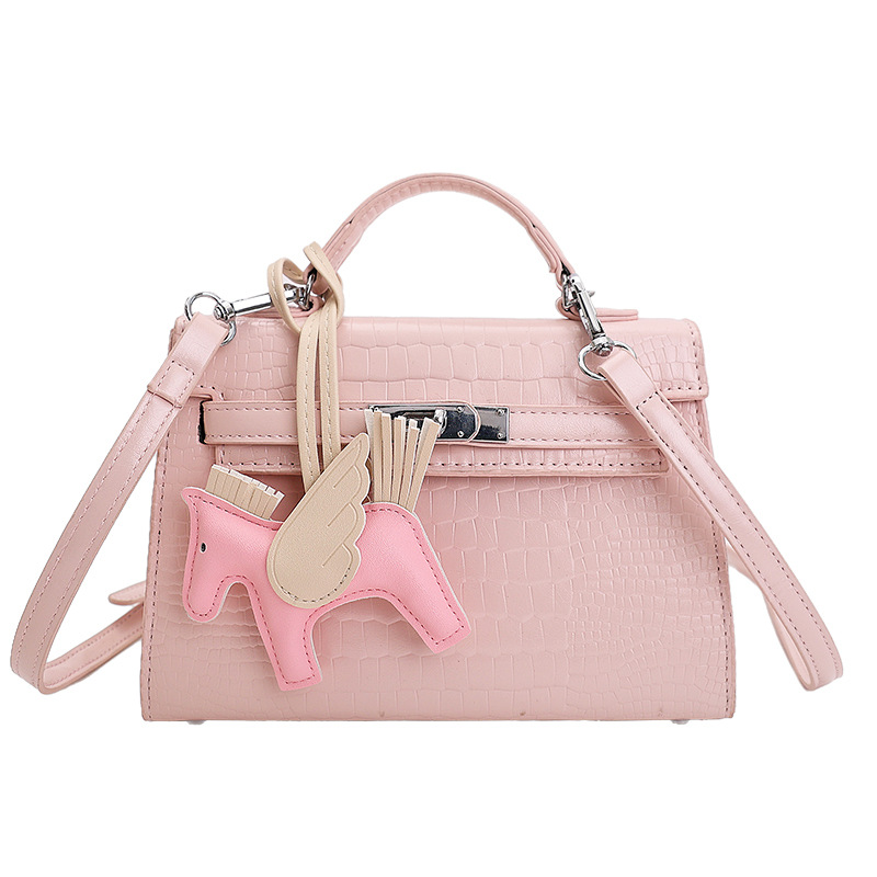 Nicho popular cocodrilo portátil bolso Kelly mujer 2026 nueva moda versátil alta sensación de hombro mochila